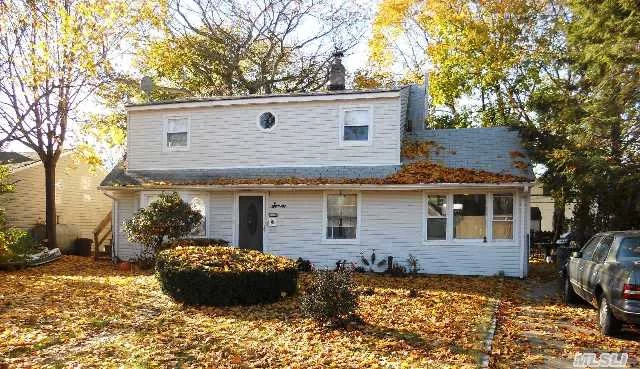 Bring Your Hammer. To This Double Dormered Cape In Island Trees School District. Mid Block Location. 200 Amp Electrical Service. Vinyl Replacement Windows Throughout. 2 Updated Bathrooms. Home Needs Updating And Being Sold As Is