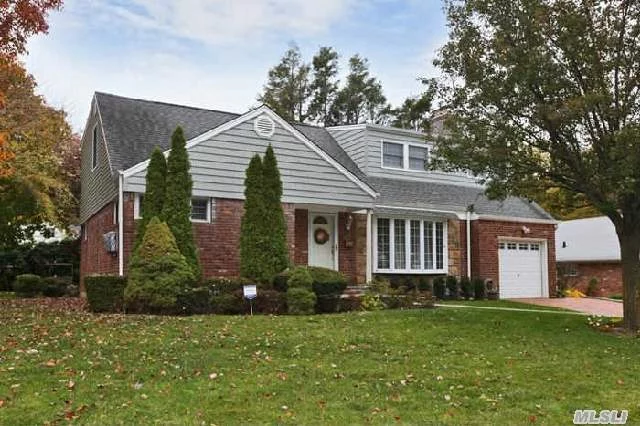 Gracious Mint Colonial, Two Masters - One Up, One Down + 3 Additional Bedrooms. New Windows, New Siding, New Leaders And Gutters, Brick Driveway, Two Baths (One New). Entire House Has Nanny Cam Inside And Outside. Large Flat Land Mid Block Location. Under 1 Mile To Town, Shops And Lirr.