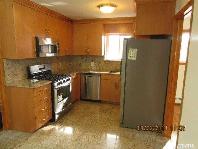 Immaculate 2 Br/1 Bath W/Hardwood Floors Throughout, Eik W/Granite Countertops & Ss Appliances. Wall Acs In Every Room. 20 Ft Long Lr And Huge Covered Terrace. Heat Inc. A Must See!!