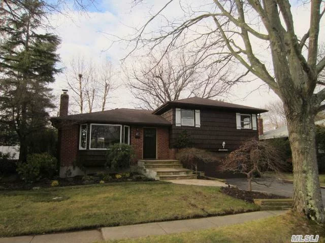 Totally Renovated Woodbury Hill Brick Split. Brand New Eat In Kitchen W Cesar Stone Counters, Stainless Steel Appliances And A Pella Slider To New Trex Deck. 3 New Full Baths, New Heating, New Cac, New Electrical Service, New Windows, New Carpeting, Polished Hw Floors, New Under Ground Sprinklers, Professionally Landscaped Backyard. Must See !!!