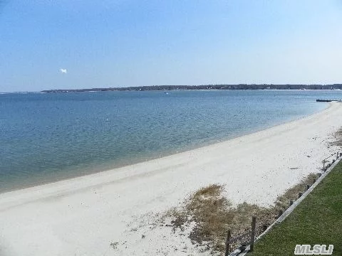 If You Want An Expansive Beach Sandy.Up To The Minute Decor At The Level Of House Beautiful. Three Levels Of Waterfront Living, Two Patios, , Balcony And Deck. Perfect For Entertaining Family And Friends..Sw Prevailing Summer Breezes. This Is It!