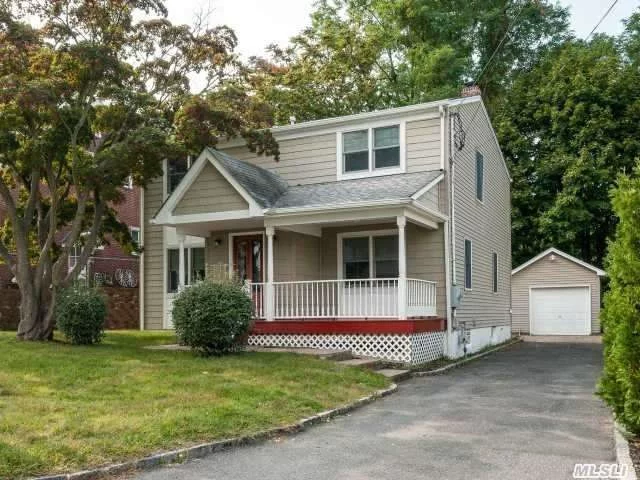 Totally Renovated Colonial In 2007, 3 Bedrooms, 2.5 Baths, Hardwood Floors, Gas Heat, 1 Car Detached Garage, Full Basement.