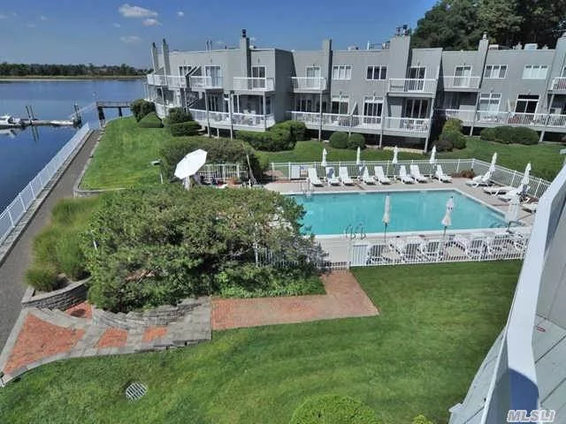 Waterfront Luxury Living, Serenity & Sunsets Describe This 3/4 Bedroom Condo. Open Floor Plan, Wine Cellar, Gourmet Kitchen, Master Suite And Relaxing Terrace Overlooking Manhasset Bay It Is The Best Kept Secret In Town, Come And Tour And Experience The Dream. Maintenance Of $971.00.