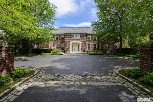 Enter A Private Courtyard To This Stately Brick Manor Home In Brookville&rsquo;s Most Exclusive Broadhollow. Lavishly Appointed With The Highest Quality Custom Craftsmanship. Two Story Mahogany Library With Dual Fireplace. Banquet Sized Dining Room For Grand Entertaining.Opulent Mastersuite. Gourmet Kitchen Overlooking 2 Flat Picturesque Acres With Sparkling Pool.