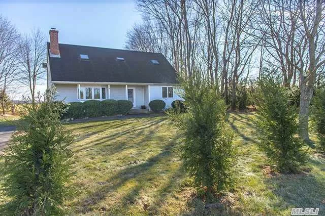 North Fork Wine Country Offering. This Home Features A Large Sunken Lr With Woodburning Fireplace, Dining Room With Farmland Views, Large Country Kitchen, Main Floor Bedroom, 2nd Floor Den With Additional Br&rsquo;s & Bath. Short Distance To Pier Ave Beach, Agritainment Farms And More!