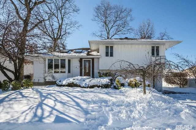 Beautiful East Birchwood Split In Great Location. Updated Kitchen With Granite, Central Air, Skylight, New Roof. Updated Windows, Sliders To Rear 15X24 Deck. Much More, Must See!