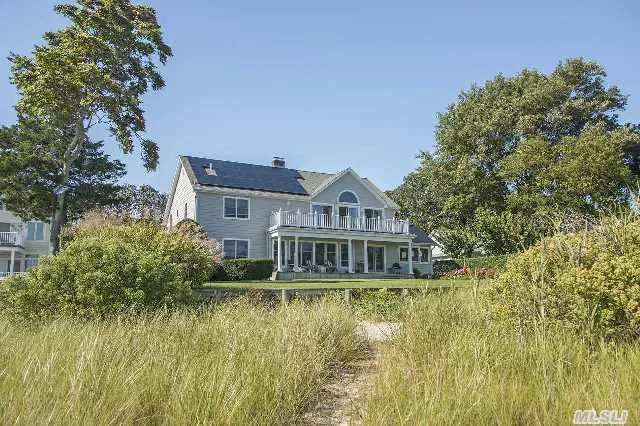 Bayfront Gem! 100+ Feet Of Waterfront On Peconic Bay. The First Floor Has Views Of Bay From Every Room; Large Open Living Room W/ Fireplace, 2 Bedrooms & Bath W/ Radiant Heat In Floor. Upstairs Master Suite Will Take Your Breath Away: Jacuzzi Bath, Walk-In Closets & Sliding Doors To Private Balcony To Take In The Views. Solar Panels=no Electric Bill. Mature Landscaping