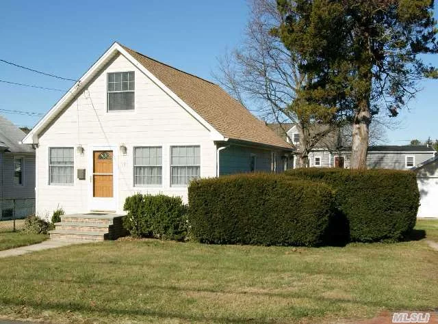 Turn Key 2 Bedroom Cape With Low Taxes! Updated Heating & Cac. Large Entry/Office Area. Living/Dining Combo. Pergo Floors. Eat In Kitchen With Lots Of Cabinets. Full Bath. Master Bedroom On 1st Floor With Spacious Closet. Partially Finished Basement With Extra Storage/Laundry/Ose. Detached Garage. Updated Roof/Windows/Siding.