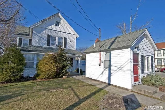 Circa 1900 Legal 2 Family Home With Additional 200 Sq. Ft. Accessory Building/Office Space. Separate Meters.