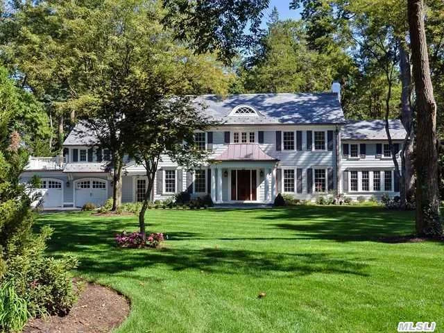 Artistically-Inspired Completely Renovated Luxury Home On Flat Professionally Landscaped 1.04 Acres In The Heart Of Flower Hill. Stunning Eik, Sunken Family Room With Stone Fplc, 5 Bedrooms, 5 Full Baths, Open Layout, Hardie Board Construction, Copper Gutters, Generator, Close Proximity To The Americana And The Lirr.