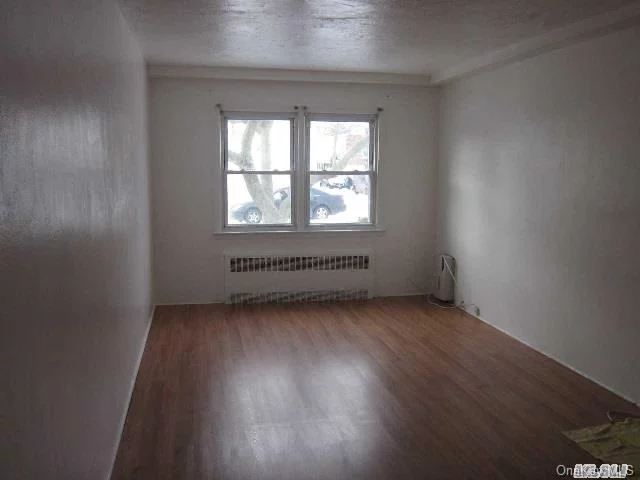 1st Floor Apt Conveniently Located Near Major Highways, Nyc Buses & Lirr. The Apt Features Hardwood Floors Through-Out, Heat & Water Is Included Plenty Of Street Parking,