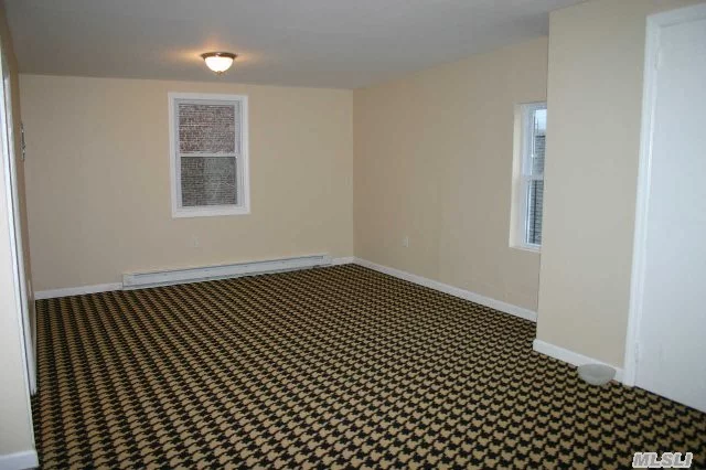 Very Spacious, Clean, And Updated 1 Bedroom Apartment W/ Convenient Parking Near Hicksville Train Station. Really Nice, And Really Big! Kitchen Has Electric Stove, No Oven Or Dishwasher. Apt Over Clothing Store, Walk Up Stairs, (No Elevator). Convenient Parking.