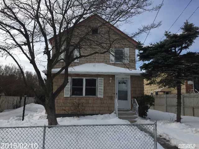 Move Right Into This Like New 3 Bedroom Colonial-Has New Kitchen, New Ss Appliances, New Carpet, New Paint, New Roof, And New Doors.