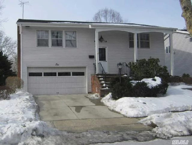 Large And Lovely Hi-Ranch In Soundview Features Eat In Kitchen, Living Room, Dining Room, Master Bedroom And Bath, 2 Additional Bedrooms And 2 Baths Complete This Home. Lots Of Space On Lower Level. Oversized Property. Cac.