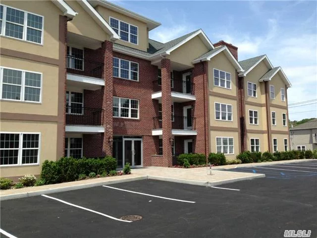 New Construction Sun Filled Unit With Open Floor Plan. Granite Kitchen With Stainless Steel Appliances, Tile Floors, Balcony, Central Air, Laundry Room, Fitness Room, And 1 Underground Parking Space. Pets Permitted With Additional Fees.