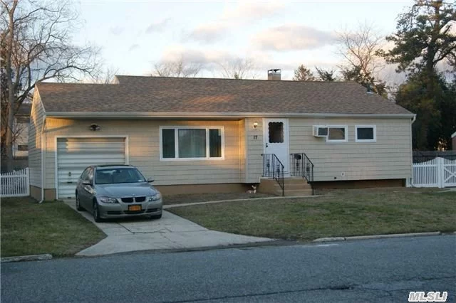 Newly Renovated 3 Bedroom Ranch, New Roof, Siding, Windows, Doors, Kitchen Cabinets/Appliances/Counters, And Bathroom. Re-Finished Wood Floors Throughout, Finished Basement. Fenced Yard, Garage, Low Taxes. Move Right In!