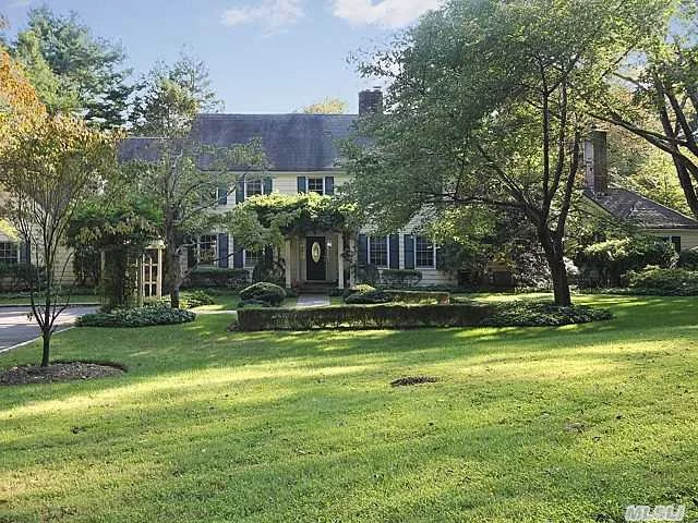 Enjoy This Muttontown Residence Surrounded By Soft Sweeping Views Of Verdant Lawns With A Slate Terrace Offering True Gold Coast Living.Sparkling Doors Of Glass Frame Views From The Living Rm, Eik, Library, & Guest Quarters. This Well Appointed Home Has Been Meticulously Executed & Offers An Unparalleled Sense Of Elegance.