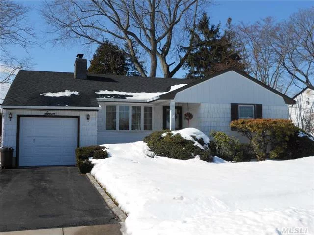 Beautiful Bay Window Starts To Show This 3Br 1 F/B Ranch With Extended Eik, Fdr, Lr W/FP, Heated Finished Basement W/.5 Bath, Laundry Area, Large Cedar Closet , Updated Windows, Boiler, Electric And New 1 Yr Old Roof. Great Location.