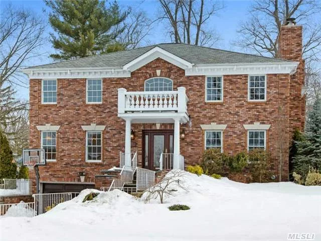 Beautifully Maintained 5 Bedroom Center Hall Colonial, Dramatic Two Story Entry Foyer, Formal Lr W/ Fplc, Formal Dr Ideal For Entertaining, Large Family Room W/ Fplc Located Directly Off The Newly Renovated Eik W/Yard Views. Custom Designed Cabinetry, Quartzite Counter Tops And Marble Backsplash, Radiant Heat, Top Of The Line Appliances, Movie Theatre, Generator, 2 Car Garage