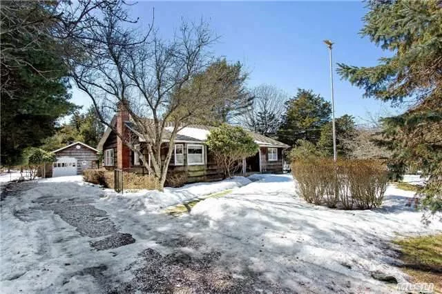 Spacious 3 Bedroom Ranch In Southold On An Acre. Detached 1 Car Garage, Full Basement With Outside Entrance. Kitchen W/ Granite Opens To Dining Area. Living Room W/ Wood Stove. Private Yard With Deck And Awning.