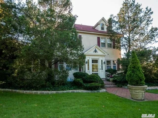 Do Not Miss The Charm & Elegance Of This 20&rsquo;S Colonial. The Home Features Flr W/Fpl, Fdr, Eik, Sun Rm, Bar/Family Rm, Butlers Pantry & Breakfast Nook. House Is Full Of High Ceilings, Moldings & Woods Flrs. The Private Yard Is Professionally Landscaped & Has A 2 Car Garage & Lg Planting Shed.