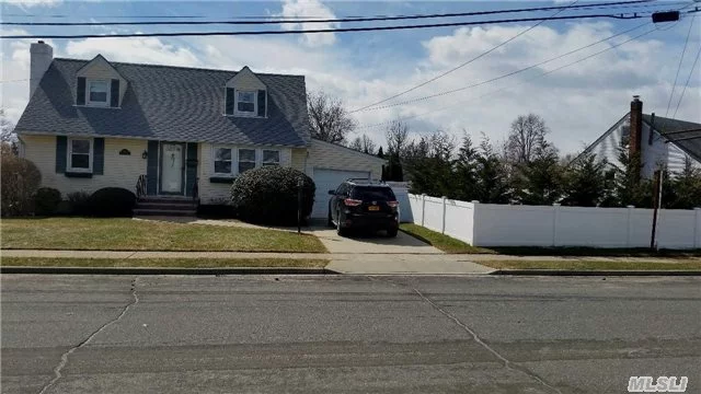 Lovely Updated Rear Dormered Cape, Recently Renovated To Open Layout & Many Cosmetic Details. Unpack & Enjoy In Sd #23, W/Unqua Elem & Great Access To Burns & M.P.Parks. Updated/New Kitchen & Baths, Stnlss Appliances & Granite, Roof, Siding, Wndws, Sprinklers, Fenced Yard, Landscpng,  Bar - Bsmt, Crown Moldings, Lighting, Newly Finished Wood Floors, Gas 2B Add Street