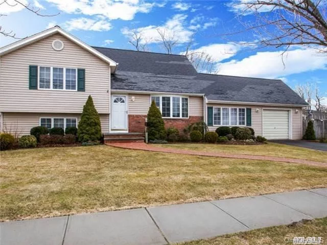 Hi And Dry...No Water From Sandy! House Has Been Expanded With An Extra Room And New Bath Off Dining Rm, Also Upper Bedroom Is Rear Dormered. Extra Storage In Garage, New Hot Water Heater, Freshly Painted. Move-In Ready!