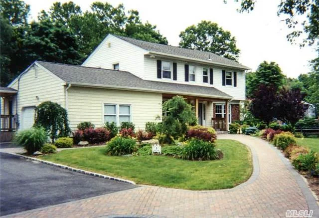 Lovely Center Hall Colonial-Private Setting-Situated On Dead End Street, Manicured Lawn Across From Green Belt, Mature Plantings, 14 Yo Fenced In Pool W/Pavers-Needs Work-As Is, Freshly Painted, New Windows, Crown Molding Throughout, Hardwood Floors, Full Finished Basement, Igs, Perfect Lirr Commute.