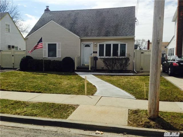 Cape Is Mid Block Location Features Updtd Kitchen & Baths, Newer Siding, New Fence (Vinyl), New Driveway And Shed. 200 Amp Elec, Great Curb Appeal. A Must See!