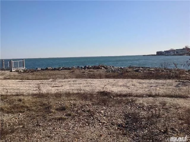 What A Spot!!! Unique 210 Bayfront View. Vacant Lot To Build The Home That Will Bring Your Dreams To Life! Property Is At The Very End And In Between Both Alhambra And Grand Canal Looking Out To South Oyster Bay.