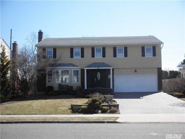 Large Elegant Colonial At The Best Section Of Carriage Homes In Roslyn ! Excellent Condition ! Great Living Space With Oversized Rooms. Beautiful Den W/Fpl & Sliders To Deck W/Huge Private Back Yard. Master Br Suite . Paver Brick Driveway .Full Finished Basement . 67X127 Property. Best Herricks Sd#9