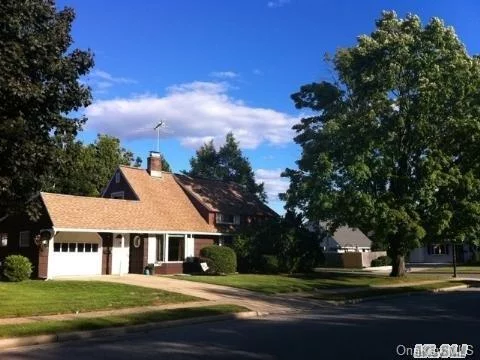 Spacious House W/ Extension Across Back & Part Rear Dormer. Nice Open Living Rm & Dining Rm. Brand New Boiler (Dec &rsquo;14) 150 Amps Most Replaced Windows . New Dishwasher. Porch W/ Sliders. Double Driveway .Oil Burner 4 Mos. Old. Gas Line Close By. B Section Location Convenient To School, Parkway, Shopping & Lirr. Low, Low Taxes.. Taxes Without Star Exemption.