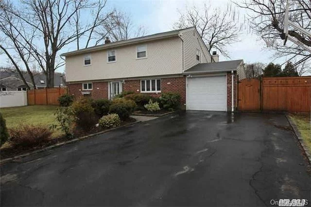 This Well Maintained Expanded Split Offers 5 Bedrms, 3 Full Baths. ( King Size Master Suite With Cathedral Ceiling.) Great Room With Raised Ceiling And Fireplace, And Sliders Out To A Deck That Overlooks A Beautiful Well Maintained Yard. Large Formal Dining Room And A True Eat In Kitchen Add To The Footprint Of This Home.