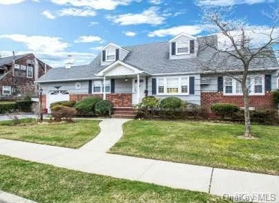 Mid Block Expanded & Extended Cape On Oversized 80 X 100 Lot. Huge Covered Patio Overlooks Large Yard. Hardwood Floors, Open & Bright Eat In Kitchen. Formal Dining Room Or Family Room. 1st Flr Mbr. Attached Garage W/Interior Access. Full Basement Gas In House.