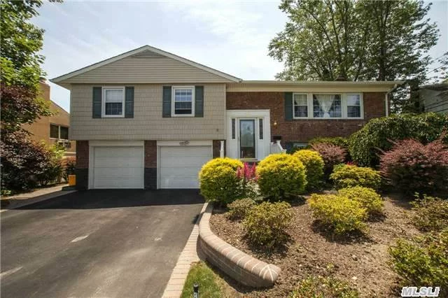 Updated Kitchen, Granite, Stainless Appliances, First Floor Has Heated Floor, Hardwood Floor On Upper Floor, Updated Window, New Dishwasher, New Deck. Beautiful Quiet Property, Great Location, Syosset School District, Too Much To List, Must See! **Tax Grievance Has Been Processed, Tax Will Be About 25% Less Than It Would Have Been For The 2015/2016 Year!!