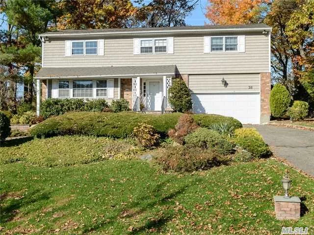 Opportunity Knocks! Fabulous Presence On Property With Circular Drive. Oversized Property. Offers Large Entertaining Rooms With Great Flow, Chef&rsquo;s Kitchen W/Skylite, Back Stair Case, Central Vac, New Roof/Siding/Gas Burner/Elec. Panel/Compressor. Finished Basement With 2 Room Office , Powder Rm And Separate Entrance. Roslyn School District. Port Washington Train Sticker!!