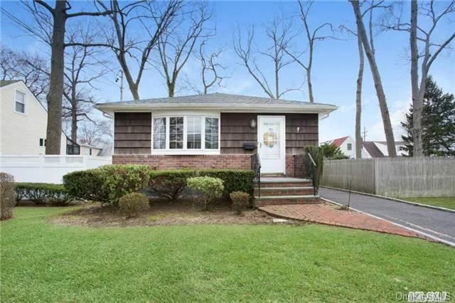 Adorable In-Line Ranch In Desirable Massapequa Woods. Bright Kitchen W/Skylight, Granite Countertops, Gorgeous Hardwood Floors, Beautifully Updated Bathroom, New Architect Roof. Huge Basement W/Side Entrance. Home Feature A Lot Of Storage Space. Detached Garage.