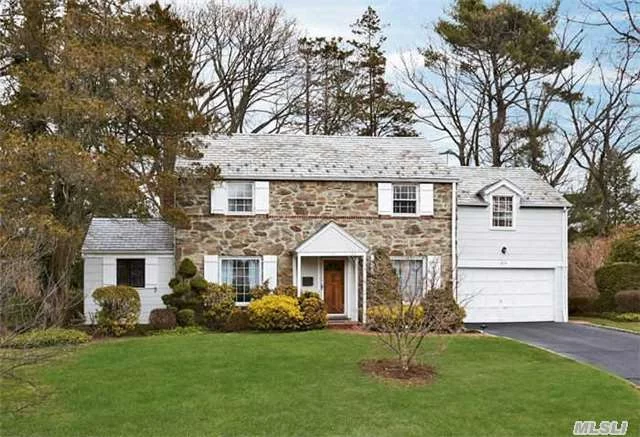 Beautiful Center Hall Colonial W/Stone Exterior. 4 Brs, 2.5 Bths, Lr W/Large Picture Windows & Fireplace. Formal Dr W/Built Ins. Eik W/6 Burner Wolf Stove. Den & Powder Room. Second Floor Has: Master Suite + 3 Family Brs & Full Bath. Full Basement, Cac, 2 Car Garage, Slate Patio, Sprinklers, Alarm System. Private Rear Property. Manhasset Sd, Munsey Park Elementary School