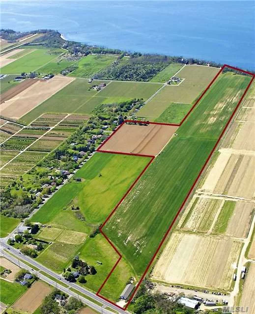 66+ Acres Of Vacant Farmland Property With 2 Acre Zoning And 559 Feet On Li Sound. There Is A 40 X 120 Barn With Concrete Floor And Electric. The Gorgeous Farm Views, Vineyard Views And Sound Views Create A Serene Environment Around The Property. With Access From Two Streets, This Property Is Perfect For Development. Public Water Now In The Street!