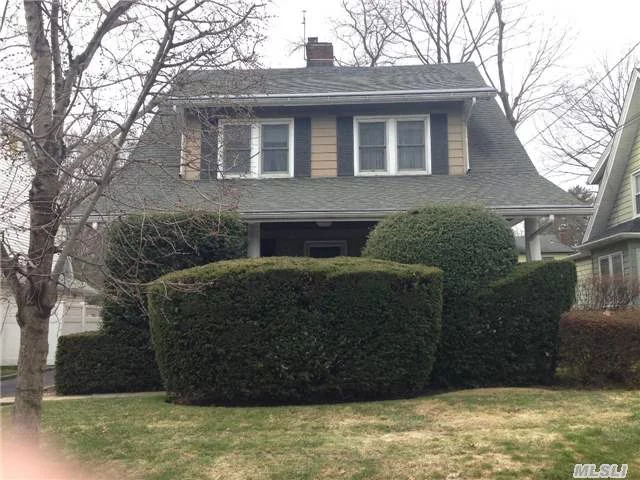 Rocking Chair Front Porch Colonial With 4 Bedrooms, Living Room W/Fpl, Eik, Dr All Conveniently Located Near Town & Train, Walk Up Attic Great For Storage, Full Basement, High Ceilings, Private Yard, Great Potential.