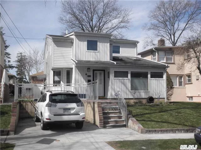 Beautiful Detached Two Family House Rebuilt In 2005 With Custom Designs On Each Floor. Fabulous Livings Space With Great Flow ! Sunny Perfect For Comfortable Livings ! Prime Bayside Location With Best Schools Ps213 , Is74 & Cardozo High School Sd#26. Must See !