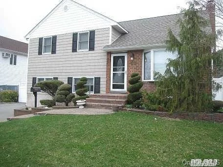 Spring-G-G Into Summer...By Moving Into This Split Level Home On A Quiet Mid-Block Location In Desirable Plainedge Schools. Offers, Mostly New Windows,  New Roof,  Alarm, Formal Dining Room,  Large Den, W Bar Area, Finished Bsmt, Igs, Alarm, Entertainment Size Yard With Inground Pool And Covered Brick Patio. Weighing Values???....This Price Will Move You!!