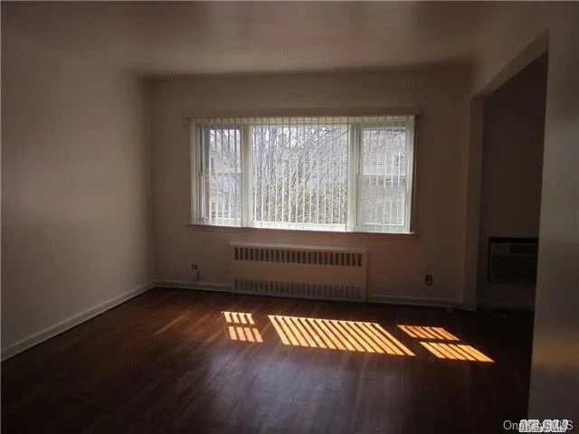 2 Bed 1 Bath Walking Distance To The Lirr. The Apt Features Hardwood Floors, Renovated Bath, Washer/Dryer, 1 Parking Spot & Shared Use Of Yard, Heat & Water Is Also Included.