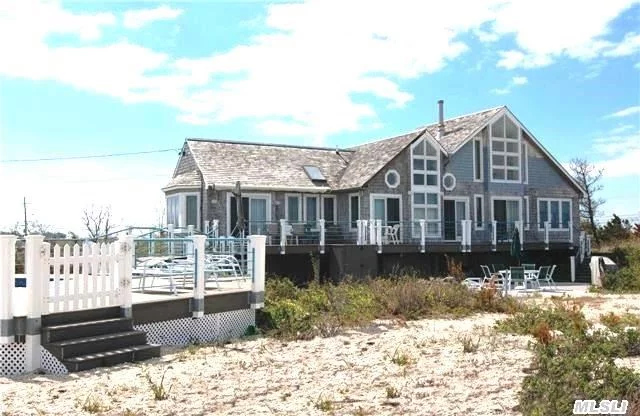 Enjoy A Relaxing Beach Vacation On The L I Sound. This Amazing Beach House Includes 3 First Floor Bedrooms And A Sleeping Loft. Open Plan Great Room With Kitchen. Wraparound Deck, Heated Pool At Deck Level. Amazing Sunrises And Sunsets. 600 Plus Ft. Of Sound Beachfront, No Bluff, Cable-Wifi. Very, Very Private And One-Of-Kind!