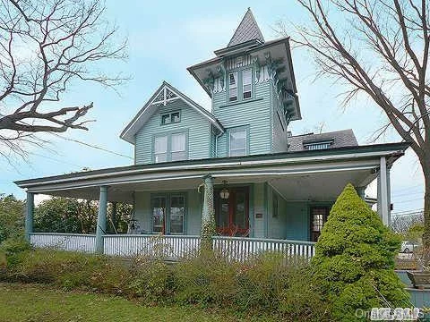 Grand 1886 Sea Cliff Landmark Victorian On The National Register Of Historic Places. Superb Location With Views Of Hempstead Harbor.  Grand Foyer, Hardwood Floors, Large Rooms, Stained Glass Sets This Home Apart. Home Being Sold As Is.