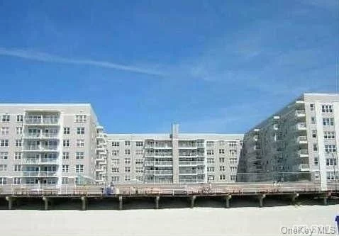 Pristine Top Floor 1 Bedroom In Luxury Building! Eff Kitchen, Formal Dining, Sunken Living Rm, Full Bath, Private Terrace With Magnificent Views Of City Skyline! Laundry Room On Every Floor, Full Workout Gym, Security System, Fios Or Cable, Assigned Parking Space, Oceanfront Olympic Pool With Direct Access Onto Boardwalk And Beach!