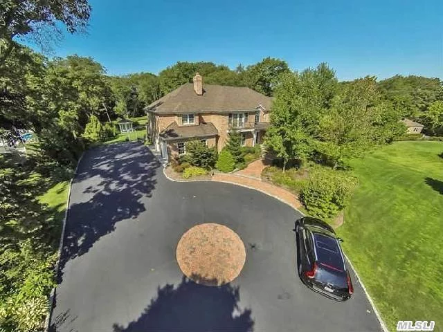 Beautiful, Custom, 6 Bedroom, 4.55 Bath Home. Two Story Entry Foyer, Crown Molding, And Radiant Heat In Kitchen And Baths. Spacious Rooms. Hardwood Floors. Fireplace. Spectacular Private Property. New Large Trex Deck Off Kitchen And Den. Great For Entertaining. Plenty Of Room For Pool And Tennis Court. Award Winning Syosset School District!