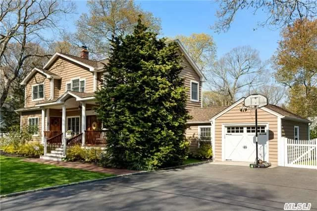 Wow!! Beautiful 3000 Sq. Ft. Colonial Completely Redone W/Private Living For Nanny Or Mom! Open Layout W/Gourmet Eik, 6 Brs, 3.5 Baths, Fin.Basement W/Playroom/Office/Laundry. Oversized Prop W/Mature Trees, Cedar Deck, Hot Tub, Outdoor Shower. Cac, Igs, Air Purifier/Humid System, Security System, Etc..Docking, Tennis&Beach Thru Village. Perfect For Large/Extended Family!