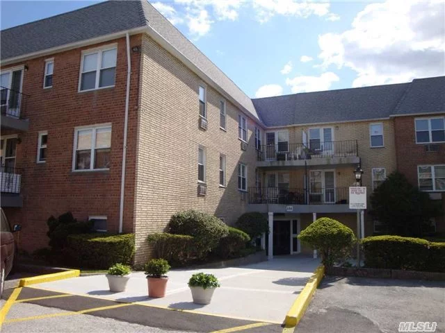 Beautiful & Spacious 2 Bedroom 2 Bath Condominium W/ Terrace & 2 Free Parking Spots! This Corner Top Flr Unit Is Filled W/ Natural Sunlight & Boasts 2 Updated Full Bathrooms, Large Lr, Formal Dr, King-Size Mbr W/ Bath & Wic, New Windows, Storage Spot & Low Common Charges Of Only $396/Month Incl Heat/Water/Gas/Strg/Ig Pool & 2 Parking Spots (1 In Garage & 1 Outside)...Wow!