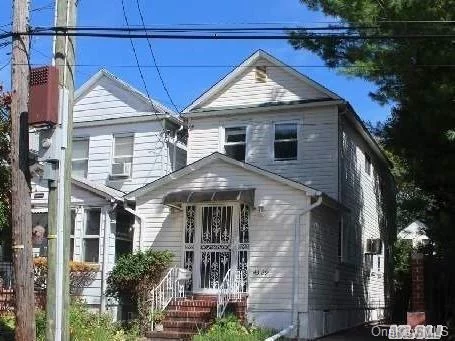 Conveniently Located With Everything At Your Fingertips! Short Walking Distance To Bell Blvd. Shops & Restaurants, Lirr, Groceries, Transportation. Cozy 3 Br 2 Ba Colonial With Finished Basement To Be Used As Additional Recreational Space. Spacious Backyard For Gardening Enthusiasts. House Will Be Painted And Wood Floors To Be Refinished